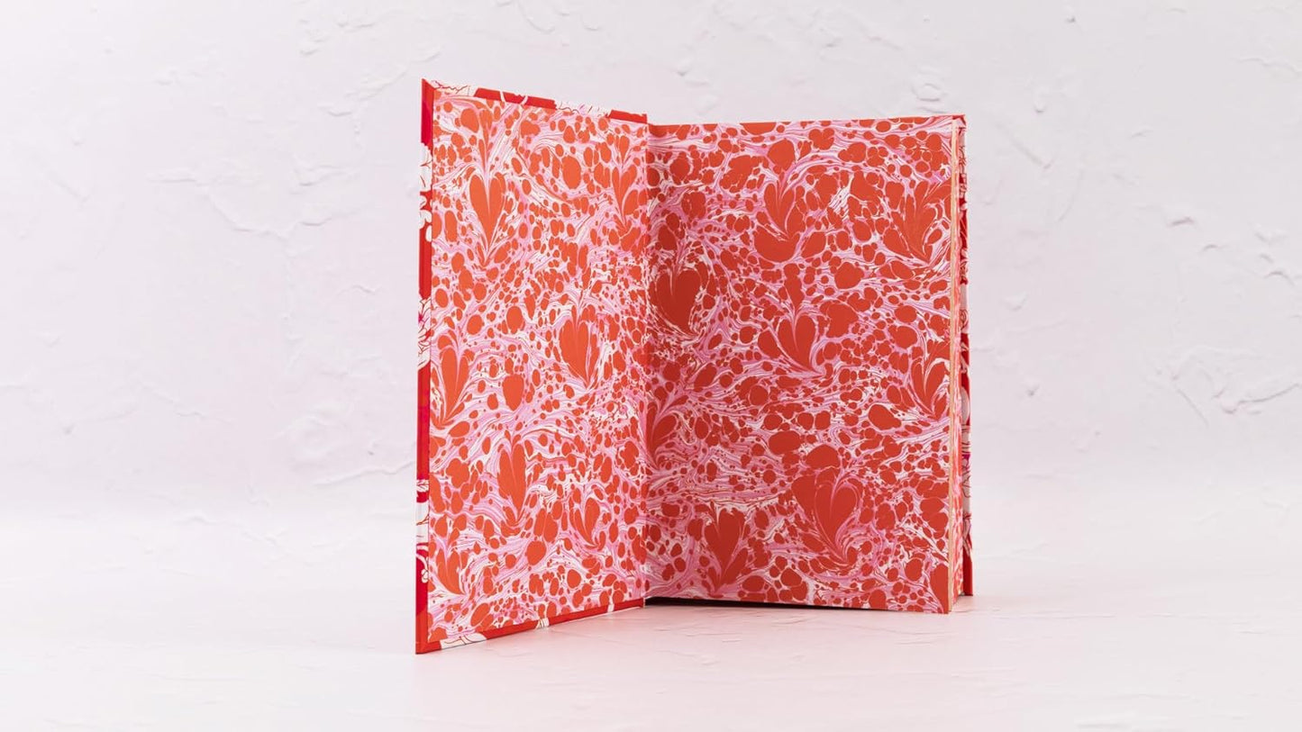 Floral patterned book on a white background