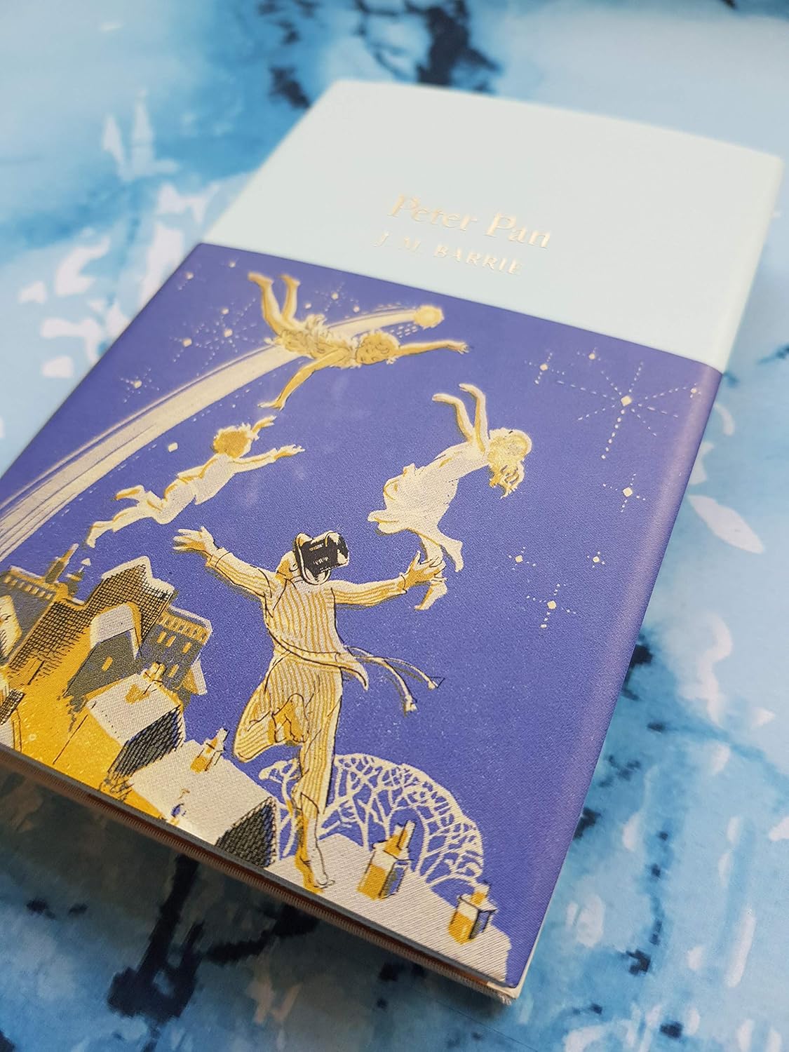 Peter Pan - by J. M. Barrie whole book on table