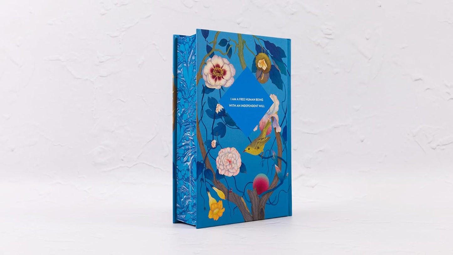 Decorative notebook with floral design on a white background