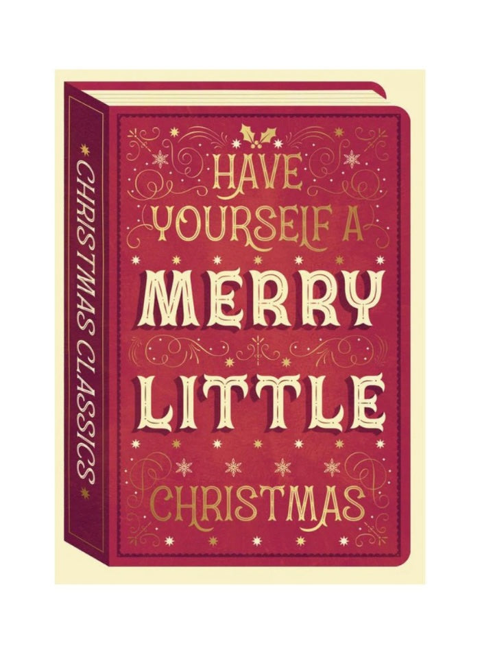 Book with decorative cover text 'Have Yourself a Merry Little Christmas' on a white background