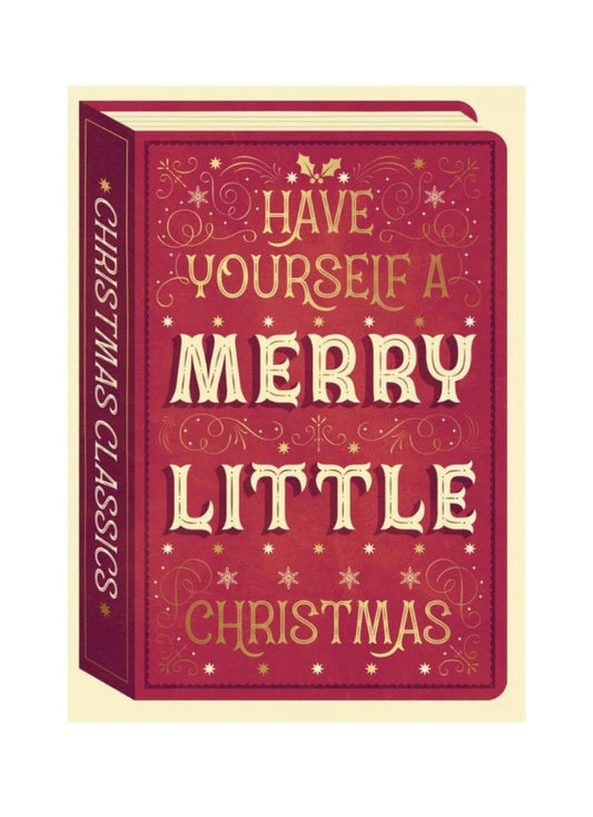 Book with decorative cover text 'Have Yourself a Merry Little Christmas' on a white background